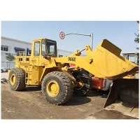 Używane ładowarki kołowe CAT966E